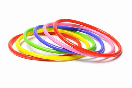 simsearch:400-06392816,k - Multicolor plastic bangles isolated on white background Foto de stock - Royalty-Free Super Valor e Assinatura, Número: 400-05338879