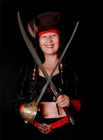 rogues - A lovely pirate girl with a cutlass Stockbilder - Microstock & Abonnement, Bildnummer: 400-05339226