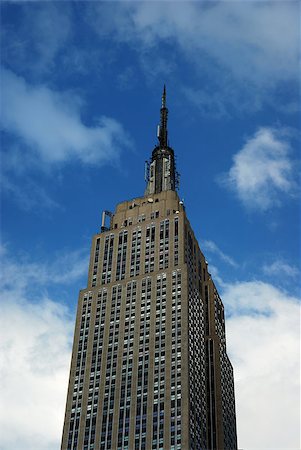 Empire State Building in New York City with a blue sky Stock Photo - Budget Royalty-Free & Subscription, Code: 400-05339826
