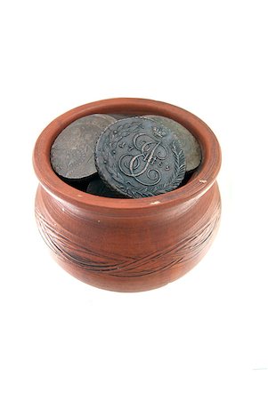 Old traditional clay mug with ancient Russian coins on white background Stock Photo - Budget Royalty-Free & Subscription, Code: 400-05339890