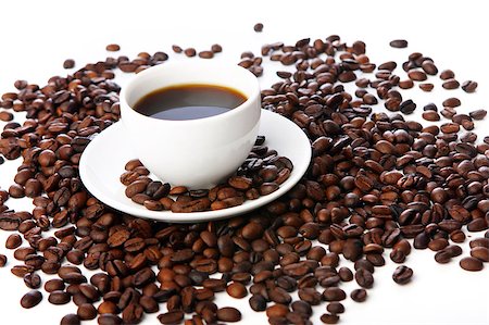 simsearch:400-04640830,k - Coffee beans with white cups on the table Photographie de stock - Aubaine LD & Abonnement, Code: 400-05339907