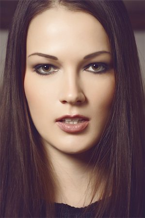 simsearch:6109-06781862,k - Closeup portrait of a beautiful brunette lady. Cross process toning. Photographie de stock - Aubaine LD & Abonnement, Code: 400-05330024