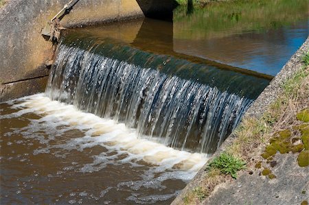 small waterfall in a drainage ditch in the netherlands Stock Photo - Budget Royalty-Free & Subscription, Code: 400-05330099