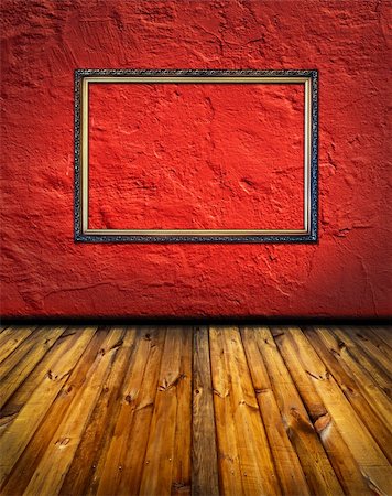 vintage red terracotta interior with empty classic frame hanging on the wall concept dissonance Stock Photo - Budget Royalty-Free & Subscription, Code: 400-05330238