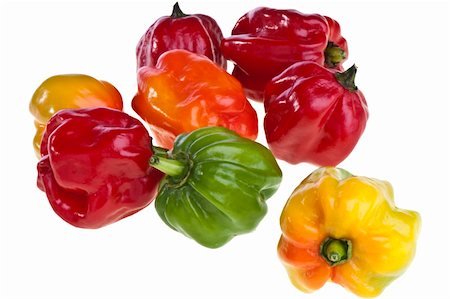 some small exotic peppers on white background Photographie de stock - Aubaine LD & Abonnement, Code: 400-05330415