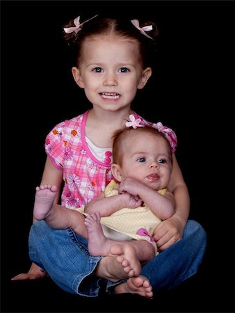 strotter13 (artist) - A nice photograph of a young child sitting with her sister. Photographie de stock - Aubaine LD & Abonnement, Code: 400-05330534