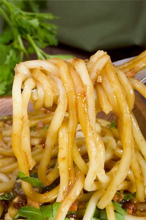 simsearch:400-05745083,k - Freshly prepared noodles on a silver fork. Fotografie stock - Microstock e Abbonamento, Codice: 400-05330760