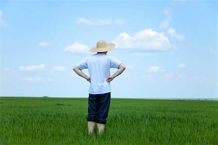 simsearch:400-04662543,k - Farmer in hat at spring field. Stock Photo - Budget Royalty-Free & Subscription, Code: 400-05330975