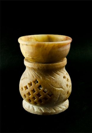 Stone censer on a black background Stock Photo - Budget Royalty-Free & Subscription, Code: 400-05331381