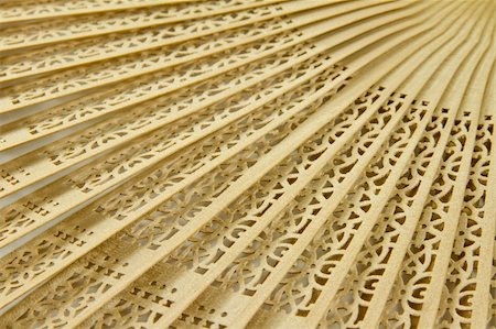 Wooden hand fan background with repeating pattern Fotografie stock - Microstock e Abbonamento, Codice: 400-05331399