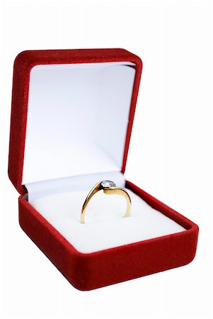 shiny engagement ring in red box isolated Stock Photo - Budget Royalty-Free & Subscription, Code: 400-05331391