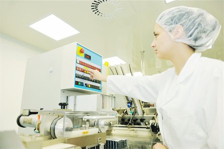 pill production - woman worker in pharmacy company warehouse Stock Photo - Budget Royalty-Free & Subscription, Code: 400-05331648