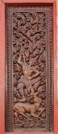 simsearch:400-05349464,k - Decorated wooden beside door in Buddhist temple, Laos Stockbilder - Microstock & Abonnement, Bildnummer: 400-05331868