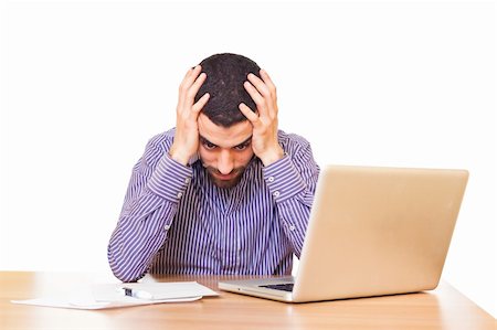 simsearch:400-04188055,k - Stressed Young Man at Work Stock Photo - Budget Royalty-Free & Subscription, Code: 400-05331948