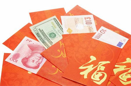 Multi national currency notes in Chinese red packets for Chinese New Year Foto de stock - Super Valor sin royalties y Suscripción, Código: 400-05332920