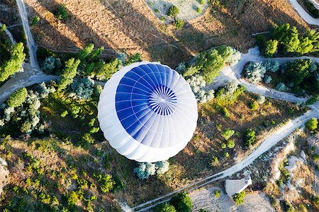 shot of blue and white aerial balloon looking down, background of dirt tracks and farms Stock Photo - Budget Royalty-Free & Subscription, Code: 400-05344398