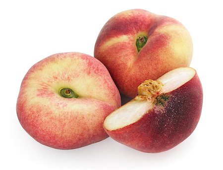 simsearch:400-07675974,k - Chinese flat peaches with half isolated on a white Stock Photo - Budget Royalty-Free & Subscription, Code: 400-05345125