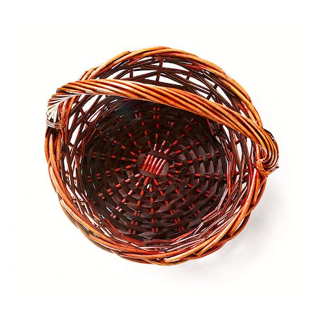 rattan basket - Handmade rattan basket on white background. Top view Stock Photo - Budget Royalty-Free & Subscription, Code: 400-05345918