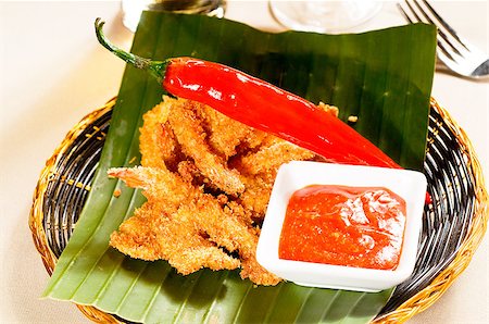 simsearch:400-04629614,k - fresh deep fried buffalo shrimps with a red chili pepper on top and sweet and sour sauce dip on side Stockbilder - Microstock & Abonnement, Bildnummer: 400-05346147