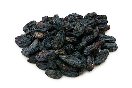 simsearch:400-07310170,k - Black raisins isolated on the white background Fotografie stock - Microstock e Abbonamento, Codice: 400-05346283