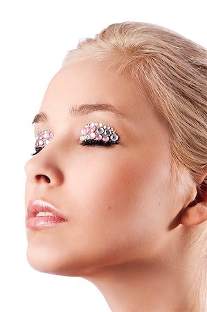 simsearch:400-04420197,k - very cute blond young woman with hair style with some shining gem stone on her eyes as a creative make up Foto de stock - Super Valor sin royalties y Suscripción, Código: 400-05346494