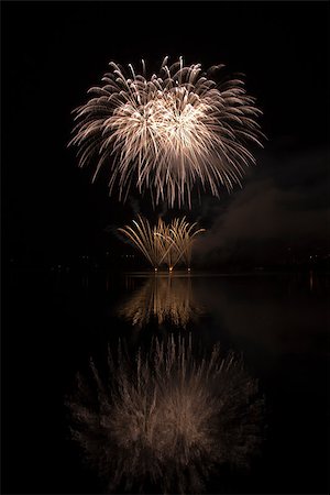 simsearch:400-04419970,k - Colorful fireworks on the black sky background and water reflections Stock Photo - Budget Royalty-Free & Subscription, Code: 400-05346884