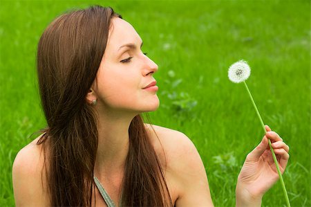 fun park mouth - Girl with dandelion on green field Stock Photo - Budget Royalty-Free & Subscription, Code: 400-05346911