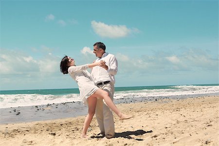 Couple dancing on the beach Stock Photo - Budget Royalty-Free & Subscription, Code: 400-05347470