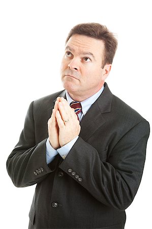 simsearch:400-05347520,k - Christian businessman praying, looking upwards.  Isolated on white. Photographie de stock - Aubaine LD & Abonnement, Code: 400-05347518