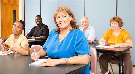 Mature woman in college, among a group of other adult students.   Banner orientation. Stock Photo - Budget Royalty-Free & Subscription, Code: 400-05347528