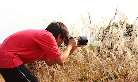 people scenic view sky hiking summer - photographer taking photo in country side Stock Photo - Budget Royalty-Free & Subscription, Code: 400-05347806