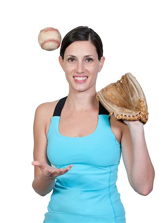 simsearch:400-05683460,k - A beautiful woman catchinging a baseball at a ball field Photographie de stock - Aubaine LD & Abonnement, Code: 400-05348441