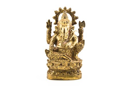 elephants in indian sculpture - Ganesh brass sit on lotus isolated Stock Photo - Budget Royalty-Free & Subscription, Code: 400-05348533