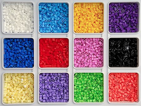 Toy pearls in many colors Stockbilder - Microstock & Abonnement, Bildnummer: 400-05348789