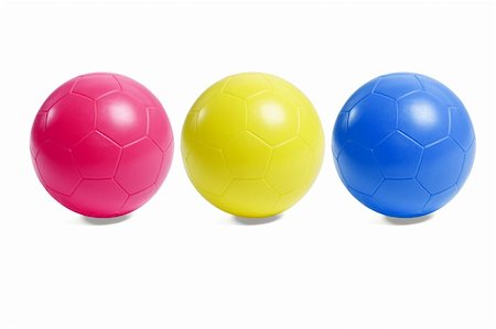 simsearch:400-06392816,k - Colorful plastic toy soccer balls on white background Foto de stock - Royalty-Free Super Valor e Assinatura, Número: 400-05348886
