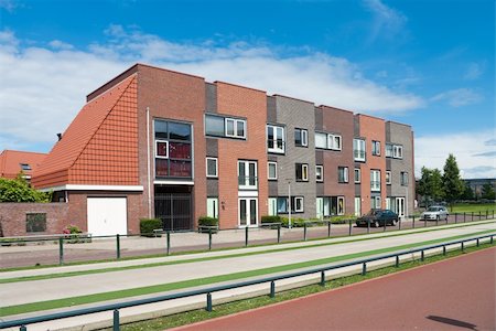 row of newly built modern townhouses in enschede, netherlands Stock Photo - Budget Royalty-Free & Subscription, Code: 400-05348926