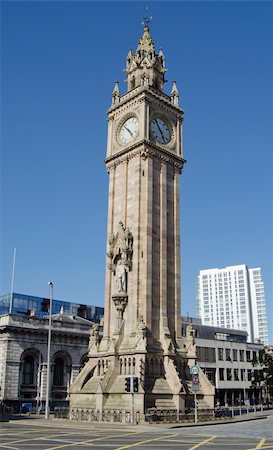 The historic sandstone Gothic clock tower was built in 1865 as a memorial to Queen Victoria's consort, Prince Albert in Queen's Square Belfast. It is one of Northern Ireland's most famous landmarks. Foto de stock - Super Valor sin royalties y Suscripción, Código: 400-05349040