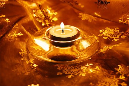 simsearch:400-09089937,k - christmas decorative gold material with burning candle Stock Photo - Budget Royalty-Free & Subscription, Code: 400-05349126