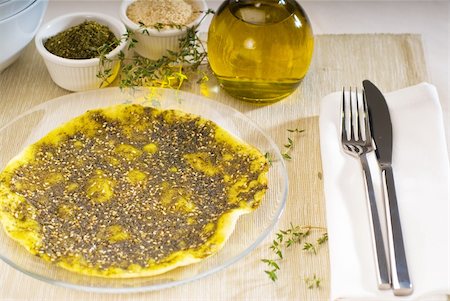 sumac - lebanese manouche or manoushe ,lebanese pizza with thyme and sesame seeds,zaatar, and extra virgin olive oil on top Photographie de stock - Aubaine LD & Abonnement, Code: 400-05349270