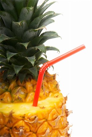 simsearch:400-04650758,k - ripe pineapple cut on top with red straw Stock Photo - Budget Royalty-Free & Subscription, Code: 400-05349281