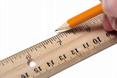 drafting tool - Someone is using a ruler and pencil to make a drawing on white paper. Stock Photo - Budget Royalty-Free & Subscription, Code: 400-05349345
