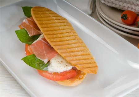 panini sandwich with fresh caprese and parma ham Stock Photo - Budget Royalty-Free & Subscription, Code: 400-05349560