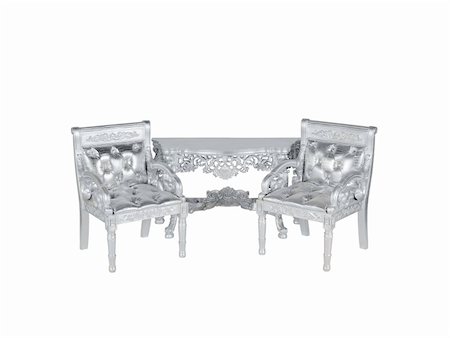 two silver leather  upholstery chairs with silver table on middle Stock Photo - Budget Royalty-Free & Subscription, Code: 400-05349863