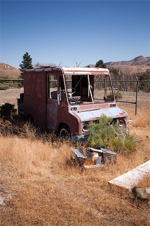 An old rusty abandoned car. Stock Photo - Budget Royalty-Free & Subscription, Code: 400-05340446