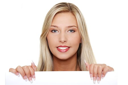 simsearch:400-04364119,k - Beautiful smiling young blond woman holding a blank signboard. Fotografie stock - Microstock e Abbonamento, Codice: 400-05341232