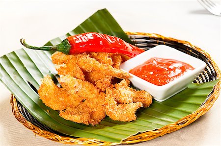 simsearch:400-04107930,k - fresh deep fried buffalo shrimps with a red chili pepper on top and sweet and sour sauce dip on side Stockbilder - Microstock & Abonnement, Bildnummer: 400-05341322