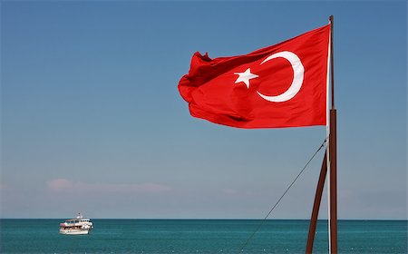 simsearch:400-05009764,k - Turkish National Flag waiving on the wind on Mediterranean Sea in Kemer (Antalya), Turkey. Photographie de stock - Aubaine LD & Abonnement, Code: 400-05342694