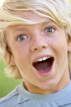 simsearch:400-04889881,k - Portrait Of Teenage Boy Looking Excited Stock Photo - Budget Royalty-Free & Subscription, Code: 400-05343029