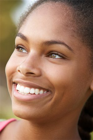 Portrait Of Teenage Girl Smiling Stock Photo - Budget Royalty-Free & Subscription, Code: 400-05343038