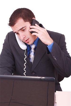 simsearch:400-07102453,k - Isolated Stressed Businessman At His Desk Working - White Background Stock Photo - Budget Royalty-Free & Subscription, Code: 400-05343765